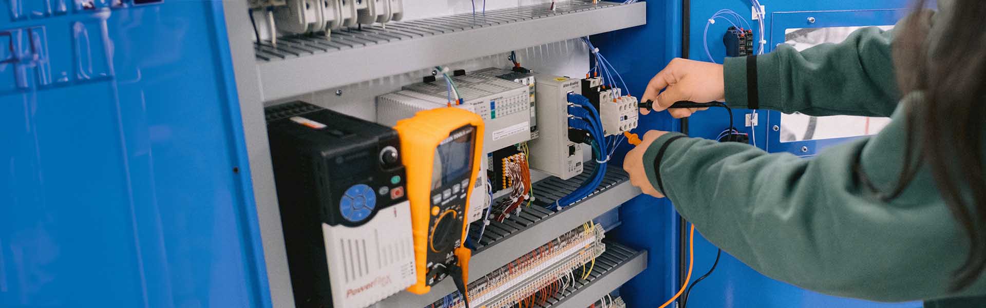 Student in an industrial technology lab.