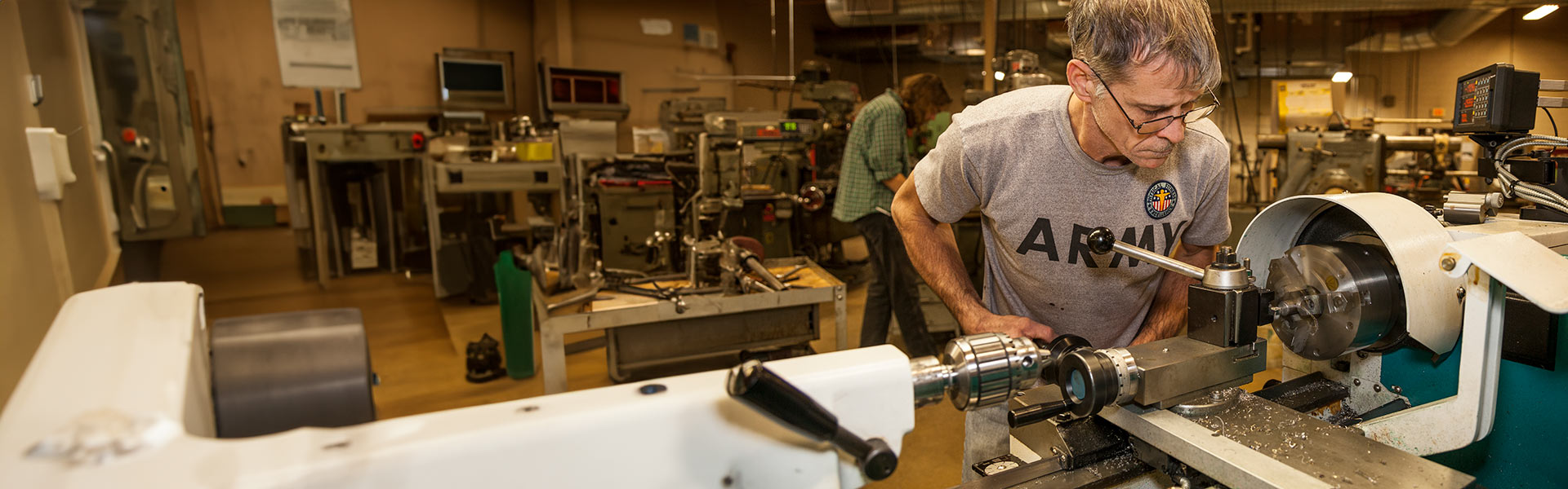 Student working on machinery