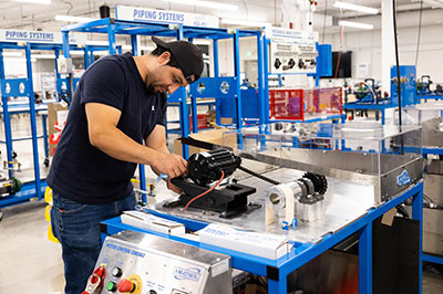 Student practicing skills in Industrial Technology Lab