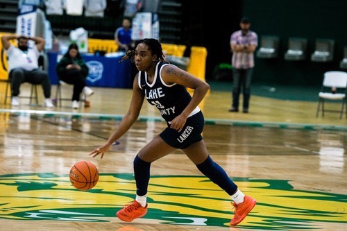 Kennedee Clark playing basketball