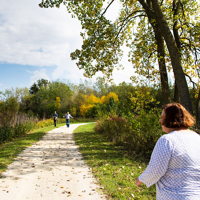 People walking on the Living Lab Trail, Grayslake Campus