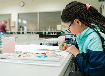 Student taking an art class