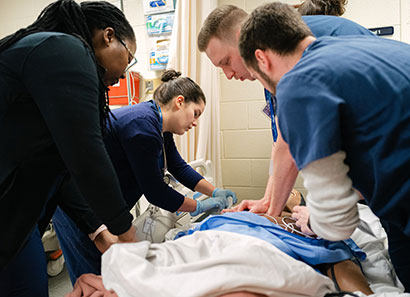 Nursing students practicing skills