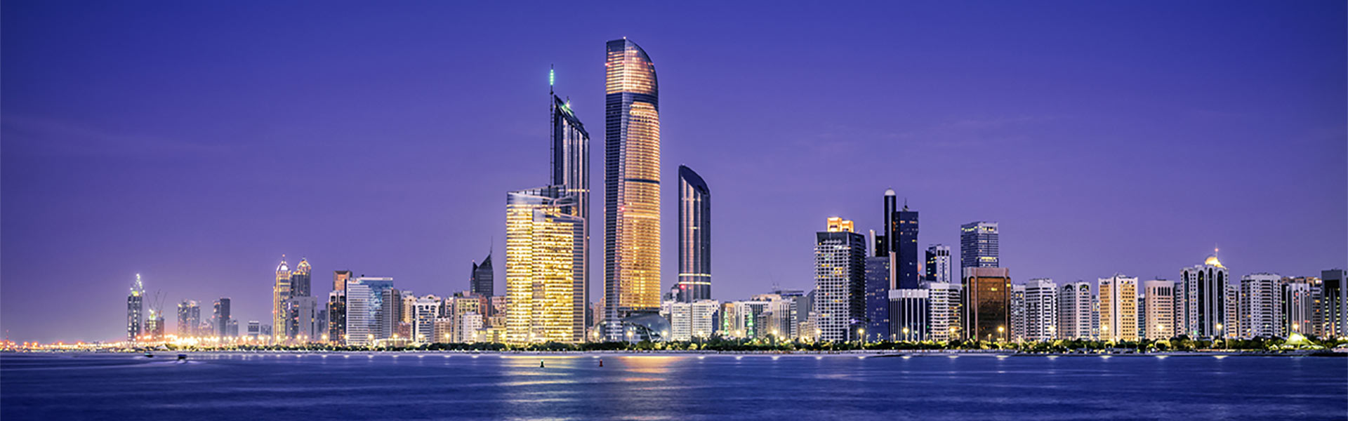 Night skyline of city in United Arab Emirates.